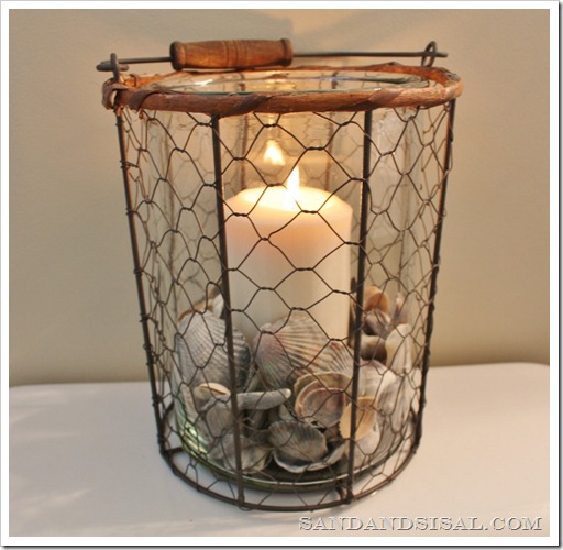 Wire Fish Basket with shells and candle