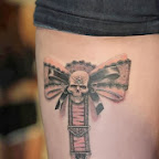 girl sexy tie skull - tattoo meanings