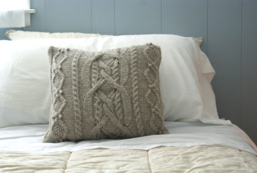 I love the warm, homey look of knit pillows. [via preciousknits on Etsy]