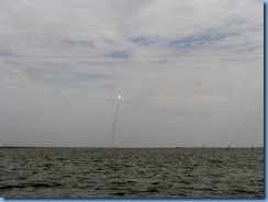 7977 private boat charter with Capt. Ron Presley  and his wife Karen - Banana River, Florida - Kennedy Space Center - Atlantis blasts off marking final NASA shuttle launch