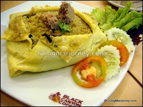 Tuna Green Curry Fried Rice Wrapped in Egg sheet (P156). 