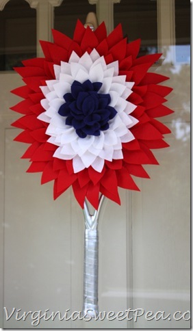 Patriotic Wreath - Use an old or broken tennis racket to make a tennis racket wreath.