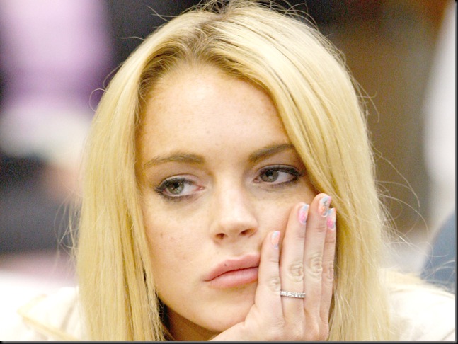 LOS ANGELES, CA - JULY 06:  Actress Lindsay Lohan attends her probation revocation hearing at the Beverly Hills Courthouse on July 6, 2010 in Los Angeles, California. Lindsay Lohan was found in violation of her probation for the August 2007 no-contest plea to drug and alcohol charges stemming from two separate traffic accidents, she is scheduled to surrender on July 20, 2010 to serve her 90 day jail sentence.  (Photo by David McNew/Getty Images) *** Local Caption *** Lindsay Lohan