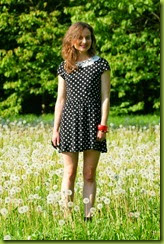 Standing in a dandelion meadow