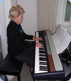 Ngaire McRae playing the Club's Korg SP250 digital piano
