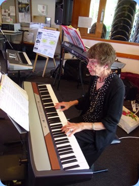 Colleen Kerr playing the Club's Korg SP-250 digital piano. Photo courtesy of Gordon Sutherland