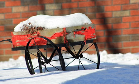 Distressed wagon in snow