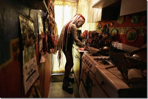 Maria-Jose-Cristerna-36-a-mother-of-four-tattoo-artist-and-former-lawyer-prepares-lunch-for-her-family-at-her-house-in-Guadalajara