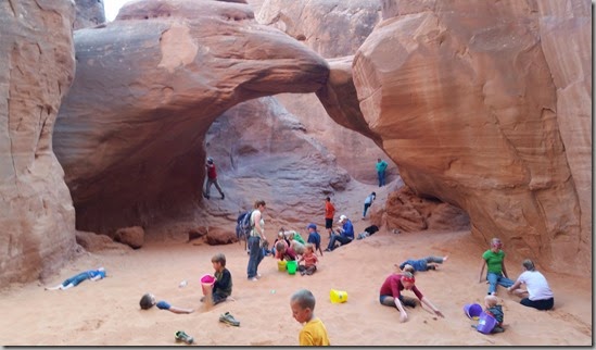 Kids playing at Sand Dune Arch