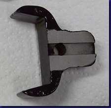 Backside of bracket and tension indicator