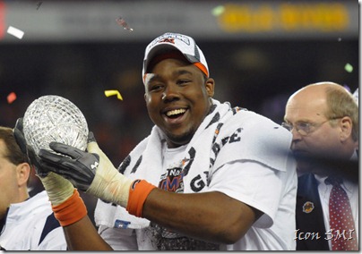 Detroit Lions and Auburn Tigers DT Nick Fairley (90) celebrates with the BCS trophy after the Auburn Tigers defeat the Oregon Ducks 22-19 in the BCS Championship Game at University of Phoenix Stadium in Glendale, AZ.