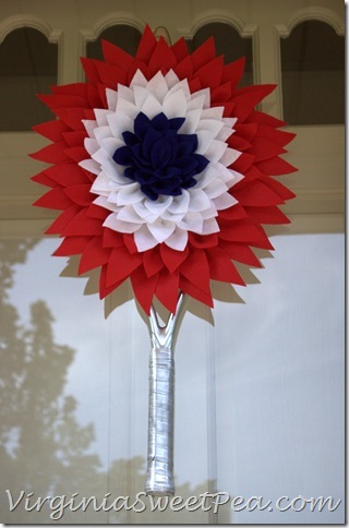 Patriotic Wreath - Use an old or broken tennis racket to make a tennis racket wreath.