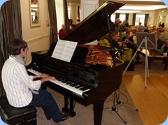Colleen Kerr playing the Yamaha Grand Piano with expression