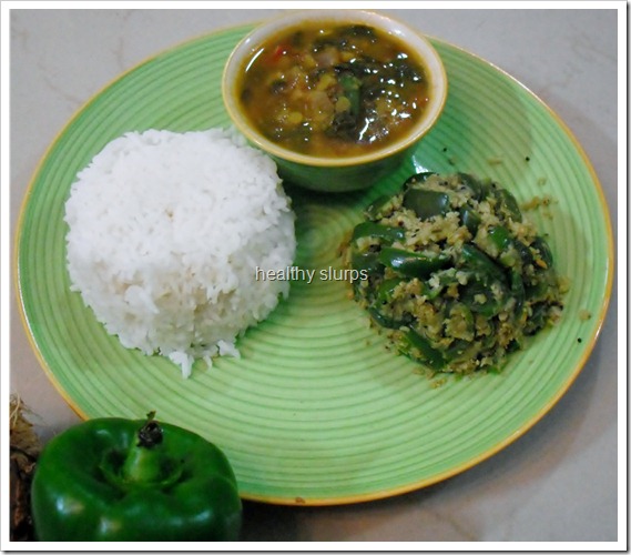 Steamed rice, dal and sir fried Capsicum