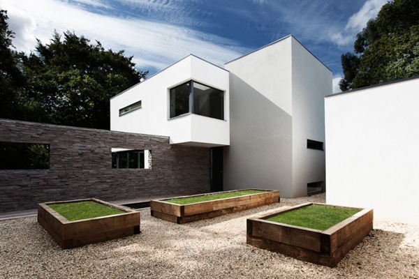 Tbone House by Coast Arquitectura casa-moderna-paredes-de-piedra-vista