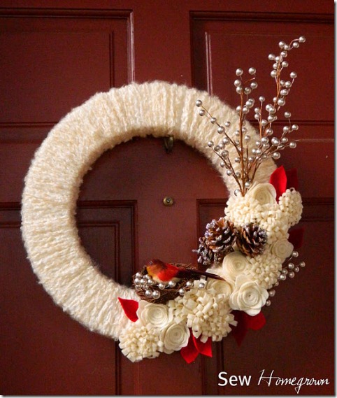 Winter wreath--yarn wrapped wreath with flowers, stems, bird in nest