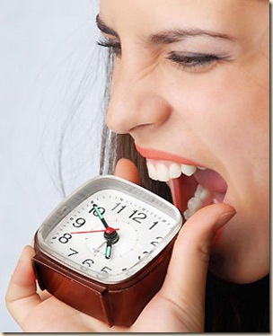 woman-eating-clock-97660689