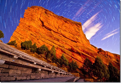 Star trails wrap around polaris behind Creation Rock