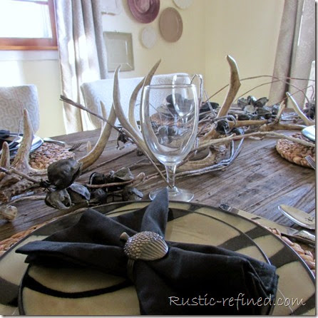 Animal print tablescape with antlers for a woodland theme