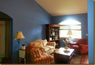 living room with blue walls