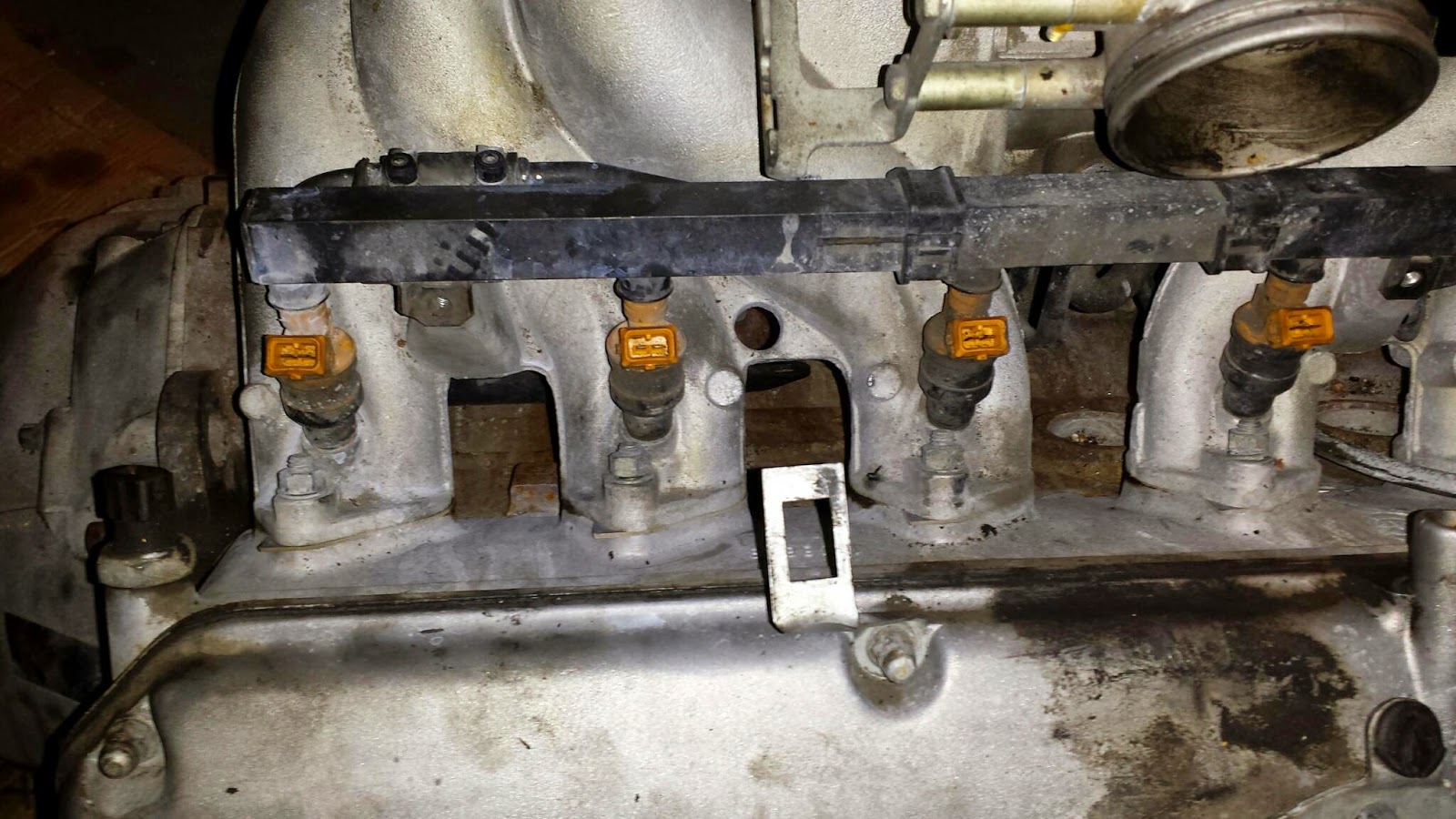 M30 Engine Rebuild Removing the intake manifold.