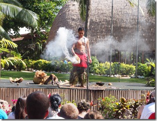 Samoan demonstrating on how to make fire with wood at the Polynesian Cultural Center Hawaii