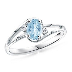 Oval-Aquamarine-and-Diamond-Split-Shank-Ring