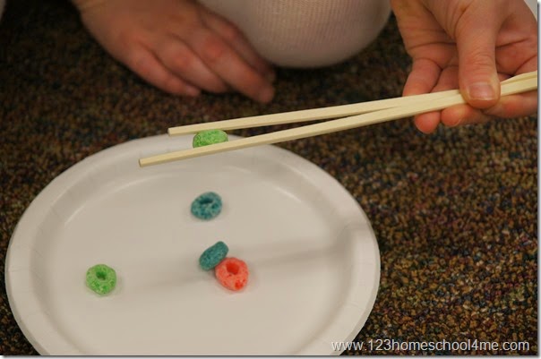 Picking up fruit loops with chopsticks sunday school activity for kids Picking up fruit loops with chopsticks sunday school activity for kids