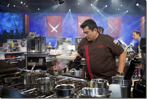 Iron Chef Jose Garces during the battle of the secret ingredient pretzels in kitchen stadium for the Round Robin #5 battle, as seen on Food Network’s Iron Chef America, Season 11. New this season to Iron Chef America are two new elements. First both chefs have to have one dish prepared and presented to the judges by 20 minutes. The dish will be judged and viewers will know which chef has the advantage at this point. This will play into strategy for the rest of the episode. Also new this season is the Culinary Curve Ball when the Chairman will force the chefs to add either a new ingredient, new technique, or implement a new cooking tool or method.