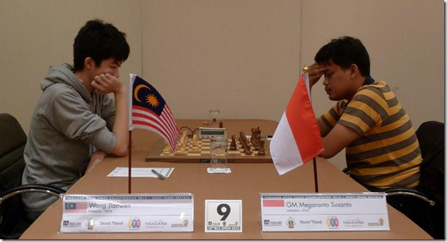 Wong Jianwen of Malaysia playing GM Megaranto Susanto of Indonesia, round 1, BCC 2013