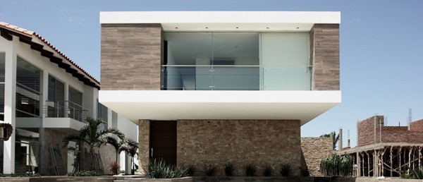 Casa C / Sommet & Asociados fachada-piedra-y-madera-Sommet-Asociados