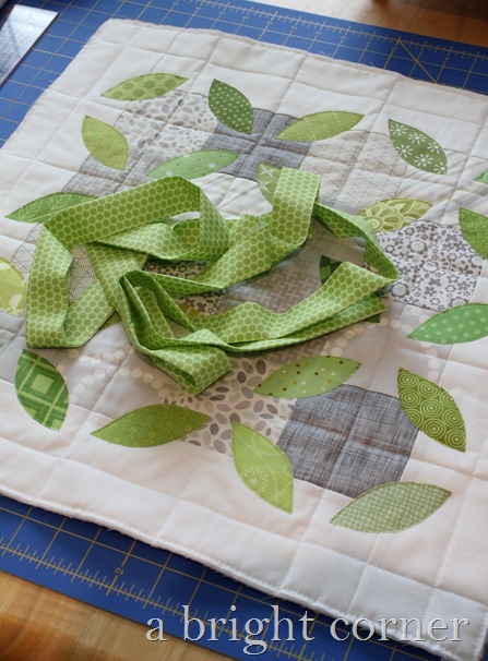 pillow with green binding