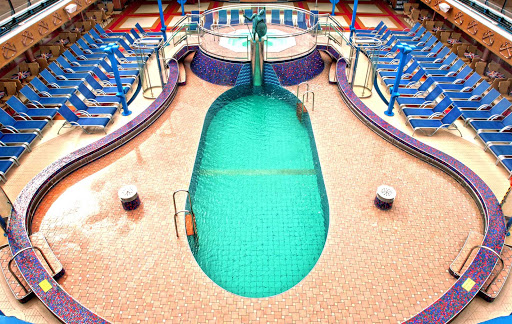 On cool days the Ulysses Pool — one of four swimming pools on Carnival Miracle — and its whirlpool are covered by a retractable glass roof. 