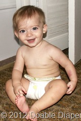 Elaine 10 months in prefold diaper coverless