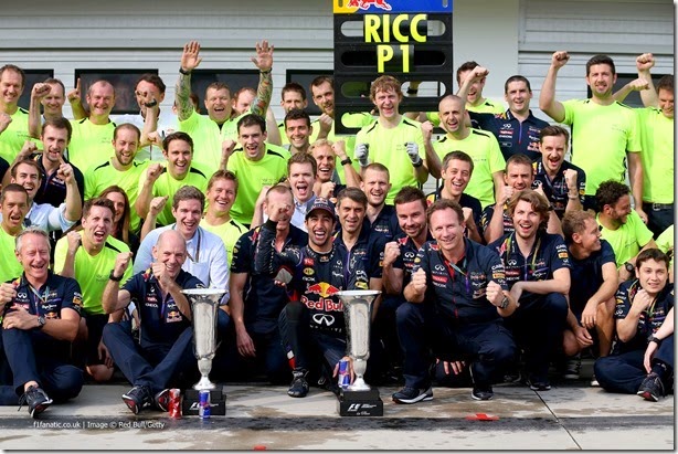 BUDAPEST, HUNGARY - JULY 27:  Daniel Ricciardo of Australia and Infiniti Red Bull Racing celebrates victory with his team and the trophy in the pit lane after the Hungarian Formula One Grand Prix at Hungaroring on July 27, 2014 in Budapest, Hungary.  (Photo by Mark Thompson/Getty Images) *** Local Caption *** Daniel Ricciardo