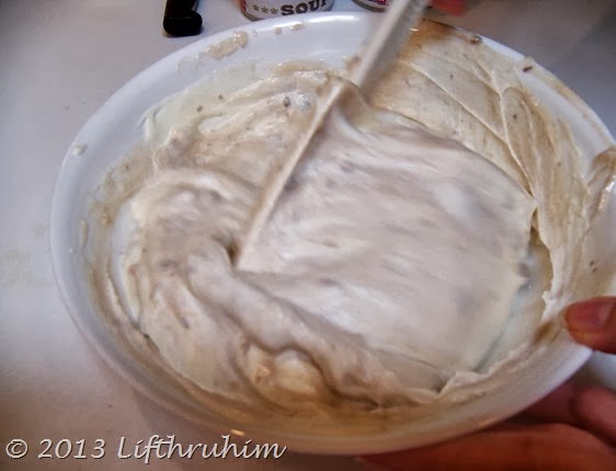 Mixing cream soup with sour cream for Crockpot Stuffing Casserole