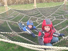 10.29.11 Cousins halloween get together Cody and Kyle on the spider web 2
