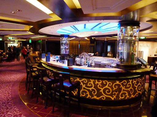 Sidle up to the bar in Celebrity Eclipse's lounge.