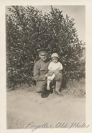 WW1 Soldier and a child Royalton Antiques