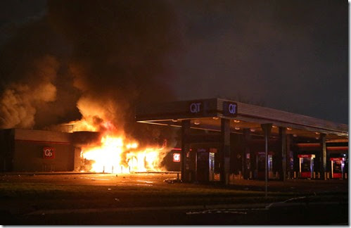 The QuikTrip in 9400 block of W. Florissant Avenue in Ferguson, Mo. burns after being looted by rioters on Sunday, Aug. 10, 2014.  The riots were sparked after community protests over a fatal officer involved shooting in Ferguson the day before.Photo By David Carson, dcarson@post-dispatch.com(Mags out, no sales, no TV and all our other usual outs for the St. Louis Post-Dispatch)