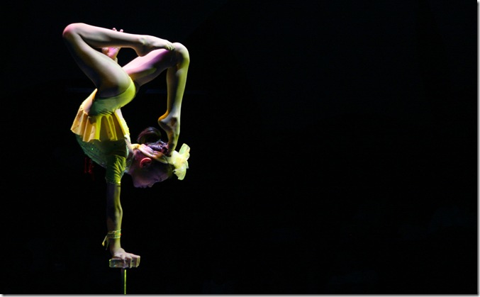 A young female gymnast performs at Shanghai Circus World in Shanghai, China.