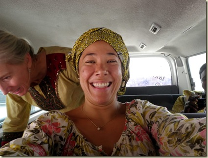 Angie ties a head scarf the Nigerian way!_sm
