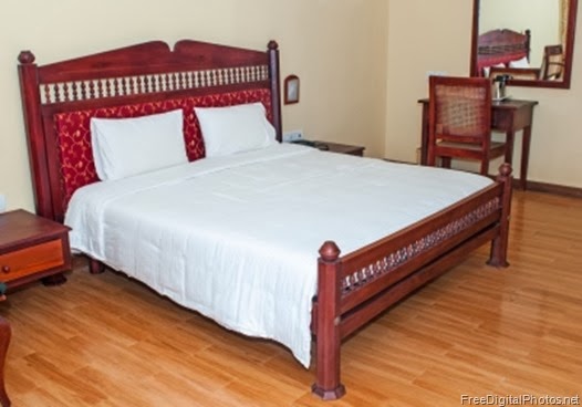 Photo of a nice neat made bed
