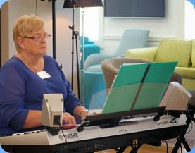 Our host for the day, Barbara McNab, playing her Yamaha Tyros 4. Photo courtesy of Dennis Lyons.