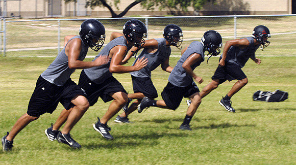 Rivera Raiders run sprints on the first day of football practice on 6 August 2012 in Brownsville, Texas. Temperatures reached into the upper 90s with high humidity. Brad Doherty / The Brownsville Herald