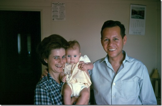Grandma Willis and Grandpa Debs Webster holding Jana