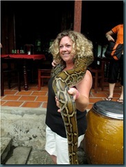Lucy is a snake charmer.MekongDelta.efarmer
