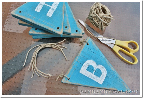 Tie pennants with string