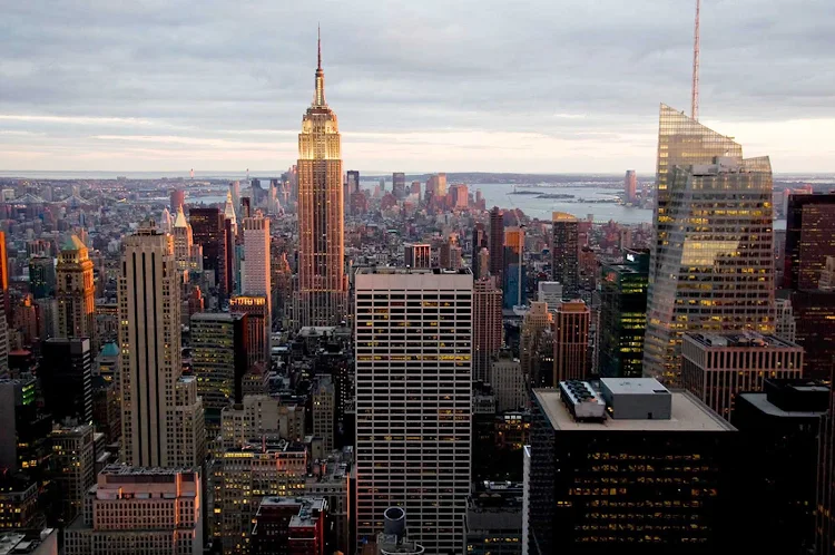 One of the best views in Manhattan: the Empire State Building at sunset, taken from Top of the Rock, Rockefeller Plaza.