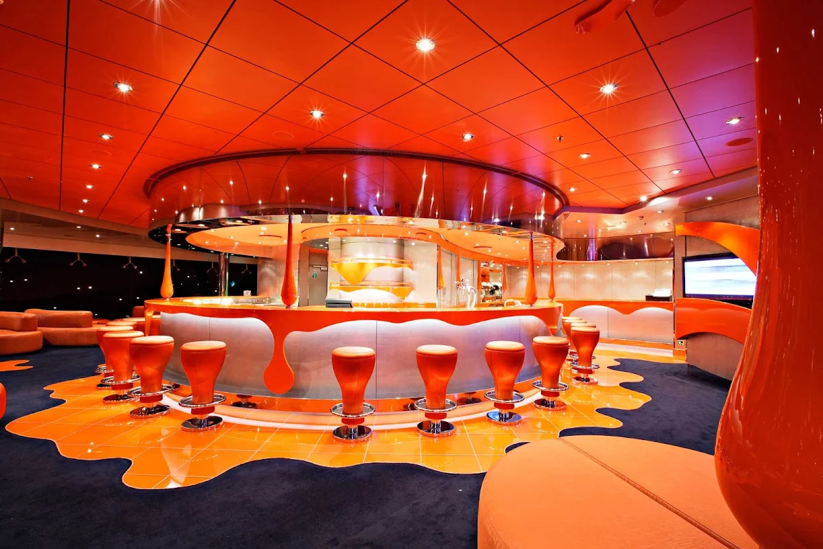 MSC-Splendida-Club-33 - If an artist walked through a lounge and splashed buckets of bright paint across the walls and furniture, it might look like the bold, whimsical interior of MSC Splendida's Club 33.